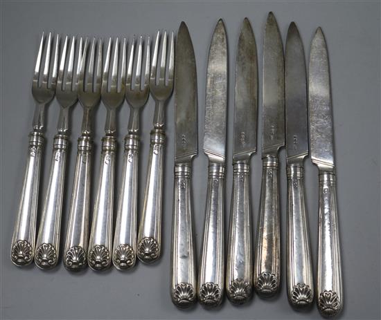 A set of six George III silver thread and shell pattern fruit knives, Moses Brent, London, 1808 and six similar white metal forks